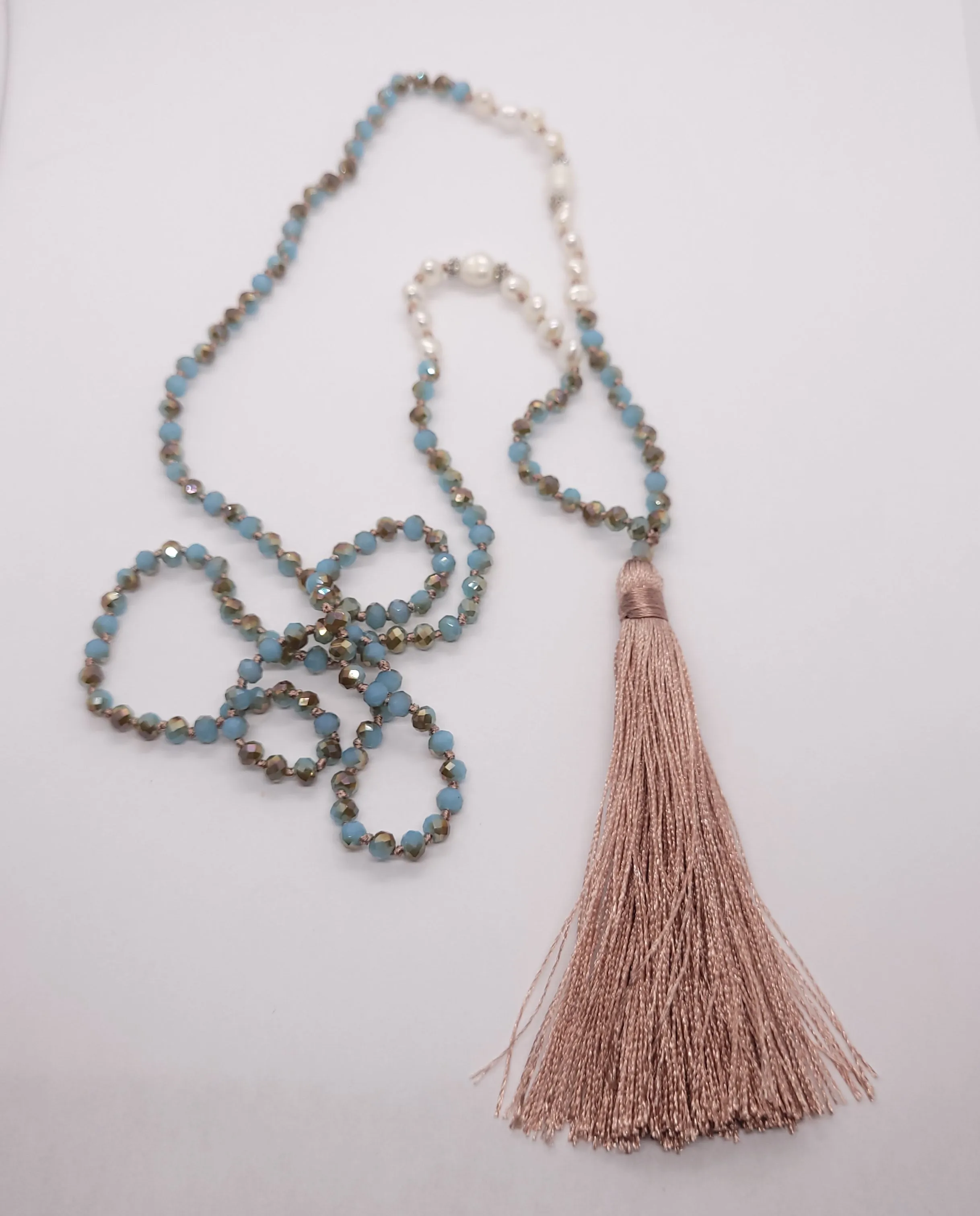 Crystal and pearl necklace with decorative tassel