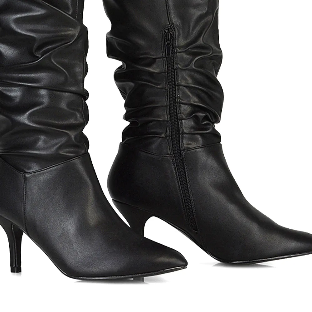 Sian Pointed Toe Knee High Ruched Stiletto High Heeled Boots in Black PU