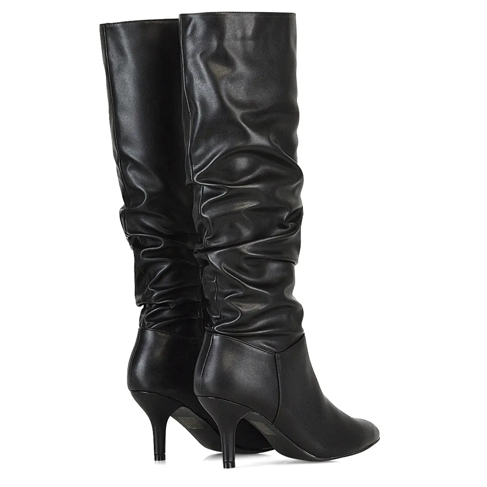 Sian Pointed Toe Knee High Ruched Stiletto High Heeled Boots in Black PU