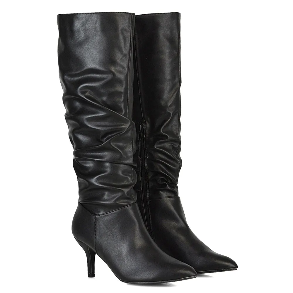 Sian Pointed Toe Knee High Ruched Stiletto High Heeled Boots in Black PU